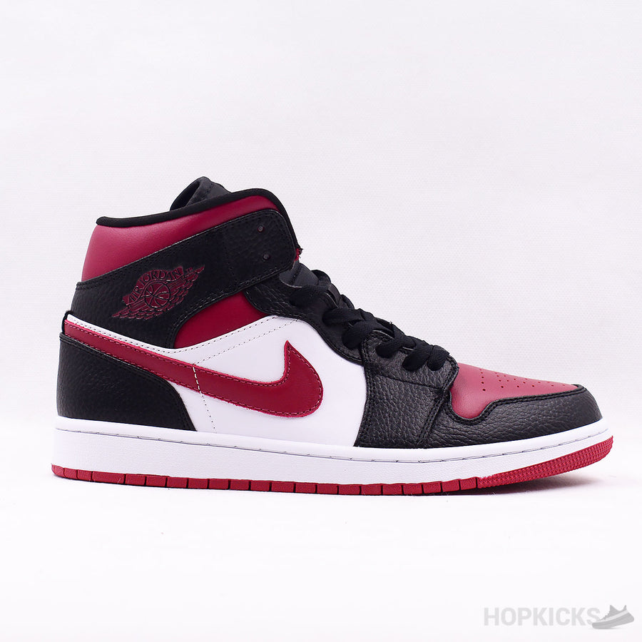 Jordan 1 Mid Bred Toe
