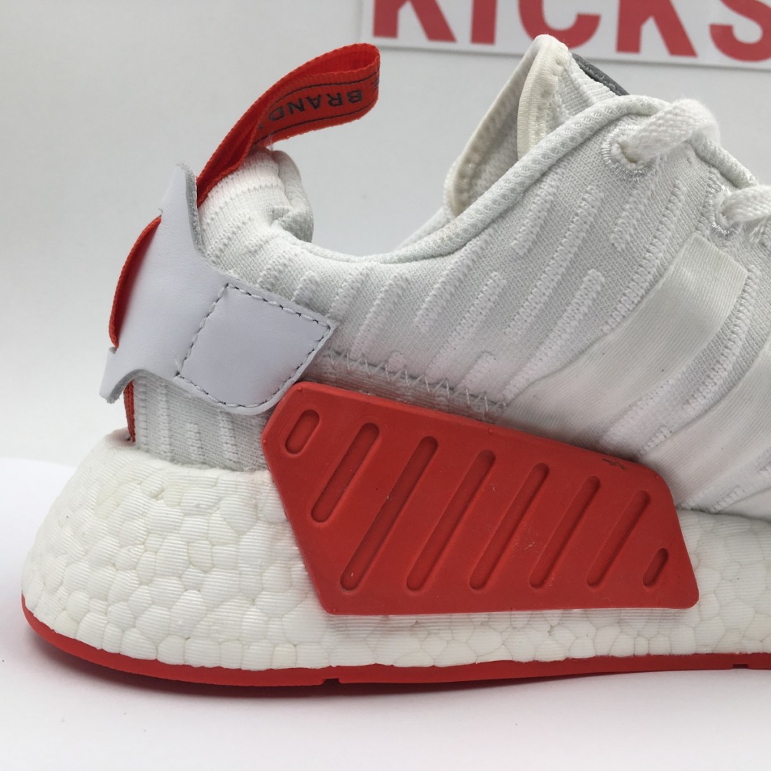 white and red nmd r2